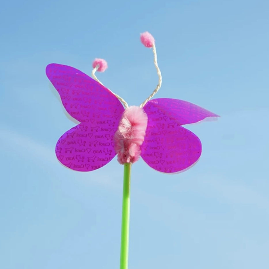 Feather & Foil cat teaser wand with natural feathers and gold handle — interactive play toy for cats